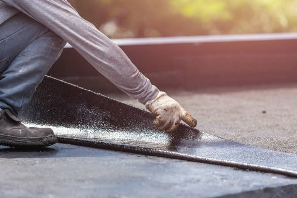 Professional Waterproofing technician working in Akron, NY